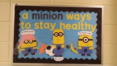 a bulletin board with minion ways to stay healthy written on it