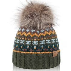 a knitted hat with a pom - pom on the top and two different colors