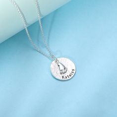 This unique Baby Feet a delightful remembrance for a new mom. It is exquisitely handcrafted in pure silver and hammered texture that suitable for daily wear. Personalize it with the names of your baby, expressing your deep love. A perfect commemorative gift for any new mom! Engraving up to 9 characters. Item specifics: Style Mothers Necklaces Pendant Size Disc Size:2CM(0.79INCH),Feet Length:1CM(0.39INCH) Hook Single Hook Material --- Chain type Rolo Chain Material Pure Silver Thickness 0.1CM(0.0 Silver Name Necklace With Birthstone In Round Pendant, Mother's Day Silver Engraved Charm Necklace, Silver Hand Stamped Name Necklace For Mother's Day, Hand Stamped Silver Name Necklace For Mother's Day, Adjustable Silver Name Necklace With Round Pendant, Silver Hand Stamped Necklace For Mother's Day, Hand Stamped Sterling Silver Name Necklace With Round Pendant, Silver Hand Stamped Round Name Necklace, Silver Round Hand Stamped Name Necklace