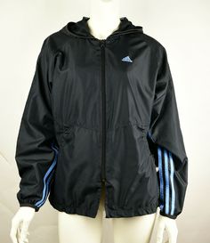 Vintage ADIDAS Women's Size M Black/Blue Cinched Hooded Running Windbreaker Condition: Pre-owned Brand: Adidas Color: Black, Light Blue Tag Size: M Material Shell/Body/Lining: 100% Polyester Arm Lining: 100% Nylon Approximate Measurements: (lying flat, zipped) Bust: 22" Length: 26" Sleeve: 29" (from hood) Comments: Jacket is in excellent pre-owned condition with no rips/holes/stains. No visible signs of wear. Two front adjustable, corded, cinch pockets. Non-removable hood. Light and breathable w Sporty Adidas Windbreaker With Logo, Sporty Hooded Windbreaker With Adidas Logo, Casual Adidas Windbreaker For Sports, Urban Hooded Track Jacket With Adidas Logo, Urban Style Hooded Track Jacket With Adidas Logo, Casual Hooded Activewear With Adidas Logo, Urban Hooded Track Jacket, Adidas Logo Hooded Track Jacket For Streetwear, Adidas Hooded Track Jacket For Streetwear