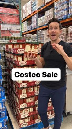 a man standing in front of a pile of food with the caption costco sale