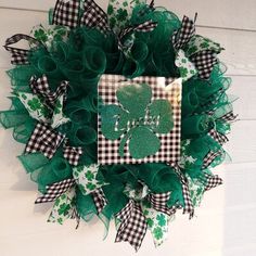 a st patrick's day wreath hanging on the wall