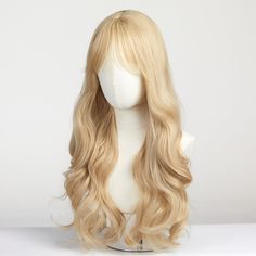 Introducing our stunning curly blonde wig,  blonde wig perfect for those looking to transform their look into a glamorous and eye-catching style. Crafted with high-quality synthetic fibers, our blonde wig boasts a lustrous and silky-smooth texture that mimics the appearance of natural hair. Our curly blonde wig is designed to offer ultimate versatility and comfort. The adjustable straps ensure a secure and comfortable fit, while the breathable construction allows for all-day wear without irritation. Whether you're attending a special event, a night out, or simply wanting to switch up your everyday look, this wig offers endless styling possibilities. With its beautiful and vibrant shade of blonde, this wig effortlessly captures attention wherever you go. The long length cascades down your b Blonde Curly Wig, Long Blonde Wig, Sandy Blonde, Long Bangs, Natural Blondes, Curly Hair With Bangs, Hair Toppers, Wigs For Women, Blonde Wig