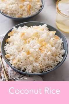 two bowls filled with coconut rice on top of a table