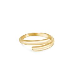 The Ettika Wrap Around 18K Gold Plated Ring is the must have accessory for day or night. Style alone or match with other Ettika pieces! DETAILS & FIT 18 Karat Gold Plated. Brass. Size 7 has circumference 55mm. SHIPPING & RETURNS Orders are processed within 1-2 business days. Packages are shipped out Monday-Friday, holidays are excluded. Priority, Priority Mail Express, and all expedited shipping before 1PM eastern time will be processed and shipped the same day. All orders placed after 1PM easte Trendy Gold Open Band Rings, Gold Stackable Rings With Open Band In Modern Style, Gold Stackable Rings With Modern Twist, Modern Twist Gold Stackable Rings With Open Band, Gold Stackable Rings With Open Band And Modern Twist, Gold Minimalist Bypass Ring With Polished Finish, Gold Bypass Ring With Modern Twist, Gold Minimalist Adjustable Bypass Ring, Gold Midi Rings With Polished Open Ring Design