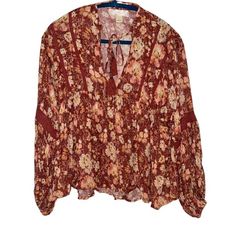 Elevate Your Style With This Band Of Gypsies Burgundy Shimmery Floral Boho Loose Fit Top In Size Small. It's New With Tags And In Excellent Condition, Featuring: - Bust Measurement (Laying Flat, Pit To Pit): 21" - Length (Shoulder To Hem): 23" - Ties At Upper Front - Elastic Sleeve Cuffs - Babydoll Style This Top Is A Perfect Addition To Your Wardrobe, Bringing A Touch Of Boho Chic To Your Look. Always On Trend - Priced To Sell - All Offers Are Accepted Or Countered Boho, Bohochic, Bohemian, Hip Flowy Floral Print Peasant Top For Festivals, Hippie Floral Print Peasant Top For Festivals, Red Bohemian Peasant Top For Fall, Bohemian Red Peasant Top For Fall, Red Floral Print Peasant Top For Fall, Red Bohemian Peasant Top For Festival, Red Floral Print Peasant Top For Summer, Red Bohemian Tops With Floral Print, Bohemian Red Tops With Floral Print