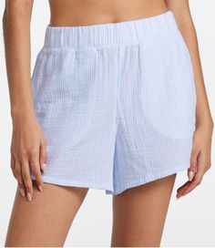 Cloud-like softness, effortless styling and a wonderfully crinkled texture in 100% cotton. These flattering striped cover-up shorts are the ideal layer for cool, carefree coverage by the water or a casual trip into town. Inseam 4". High-Rise (Classic Fit): Sits at waist. 100% cotton in a lightweight 4 oz. crinkled gauze. Machine wash and dry. Comfortable pull-on elastic waist. Two hand pockets. Imported. | Women's Cloud Gauze Cover-Up Shorts, Stripe, Cotton Wishlist Summer, Striped Swimwear, Active Swimwear, Rash Guard Swimwear, Rash Guard Women, Active Outfits, Swim Shirts, Women's Cover Up, Summer Fits