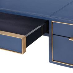 a blue desk with two drawers and gold trimmings on the bottom half of it