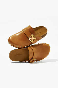 Back in stock. The Studded Mellow Mule in Caramel Corn. Limited quantities available. Luxury Leather Walking Shoes, Luxury Casual Wedge Heel Mules, Luxury Leather Mules, Luxury Platform Mules, Luxury Casual High Heeled Boots, Luxury Leather Casual Shoes, Luxury Casual Leather Loafers, Luxury Leather Studded Mules, Luxury Studded Flats