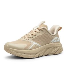 the women's athletic shoe is beige and has an upper lace that matches it