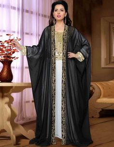 Subhanallah Jacket Style Partywear Kaftan 👗 Buy latest Kaftan which are made up from best quality fabrics with latest styles from our large collections at https://bit.ly/3eafqPe Shop Now : https://bit.ly/3kVJd1N Buy online @ $81.95 #ladieskaftans #modernkaftandress #traditionalkaftan #dubaikaftandressesforsale #elegantkaftan #arabicattire #caftan Luxury Designer Dabka Kaftan, Luxury Fitted Traditional Wear With Naqshi, Luxury Bollywood Style Jamawar Dress, Luxury Ceremonial Floor-length Kaftan, Luxury Floor-length Ceremonial Kaftan, Luxury Embroidered Floor-length Abaya, Luxury Black Abaya For Festive Occasions, Luxury Bollywood Style Abaya For Eid, Luxury Party Wear Sets Floor-length