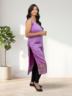 Elevate your festive wardrobe with our EthnoChic Lavender Silk Kurta. Made from premium Mangalagiri silk, this kurta is designed for those special moments. Embrace the timeless elegance of silk and feel effortlessly graceful. Whether it's a celebratory occasion or a group gathering, this kurta ensures you exude charm and sophistication. Add a touch of luxury to your ensemble with this Lavender Silk Kurta from EthnoChic. Key Specifications : Material Mangalagiri Silk Occasion Festive Type Kurta Festive Purple Straight Kurta Traditional Wear, Traditional Purple Straight Kurta With Pallu, Festive Lavender Salwar Kameez For Diwali, Bollywood Style Lavender Kurta For Festive Season, Festive Lavender Salwar Kameez, Purple Self Design Kurta For Eid, Purple Cotton Silk Salwar Kameez With Straight Kurta, Purple Art Silk Kurta With Zari Work, Traditional Lavender Salwar Kameez For Festive Occasions