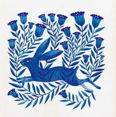 a blue and white drawing of a rabbit surrounded by flowers