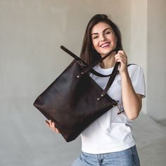 This handmade women tote bag is produced by crazy horse leather. It has one pocket inside. The bag has a high-quality zipper that secures your belongings. It holds the shape perfectly and you may be confident that your things like cell phone, tablet, lap-top are safe. This bag is simple, reliable, and durable. Its universal look allows using the tote bag for various purposes. One may take the bag to the work, shopping, meeting, or walk and feel comfortable with it in any condition. SIZE: 〰️ MEDI Zipper Closure Satchel As Gift, Hobo Tote Bag As Gift, Hobo Tote Bag For Gift, Large Capacity Tote Shoulder Bag For Gift, Large Capacity Tote Shoulder Bag Gift, Gift Leather Handles Bucket Tote Bag, Gift Bucket Bag With Top Carry Handle, Gift Tote Bucket Bag, Large Capacity Tote Weekender Bag As Gift