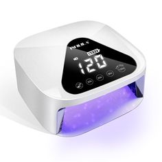 an electronic clock with purple light on it's display screen and the time displayed