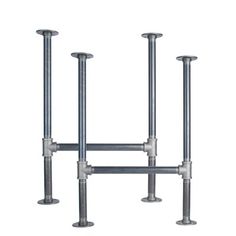 three metal poles with different sizes and shapes