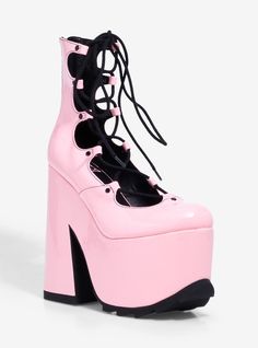 Think pink with these statement platform heels! They feature black lace-up details at the center and an extreme platform heel.Listed in women's sizes.Platform: 3''Heel: 6' 14''Vegan patent leather upper; EVA soleImported Pink High-top Platform Boots, Pink Pure Vigilance Platform Boots, Hot Topic Shoes, Pink Platform Lace-up Boots With Round Toe, Gothic Shoes Platform Pink, Dolls Kill Platforms, Shoes Anime, Pink Platform Heels, Galaxy Black