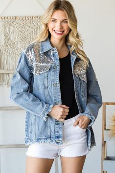 Button Up Long Sleeve Denim Jacket with sequin detail on shoulders and down back Model is 5'7" and wearing a size Small. Embellished Medium Wash Denim Jacket For Fall, Casual Spring Outerwear With Sequins, Casual Sequined Outerwear For Spring, Trendy Spring Outerwear With Contrast Sequin, Casual Long Sleeve Denim Jacket With Sequins, Embellished Denim Jacket For Fall, Casual Fall Outerwear With Sequins, Casual Sequined Outerwear For Fall, Spring Party Casual Denim Jacket