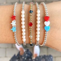 We're celebrating America in the way we do best - with jewelry handmade in the USA (Hoboken, NJ)! This listing is for one of our three red, white, and blue bracelet styles. Choose a triple mini heart bracelet, a triple mini star bracelet, or a swarovski bracelet. Also choose between gold-filled, rose gold-filled, and sterling silver finishes. One inch of extra chain lets you adjust the bracelet to your preference. All items are hand-made in the USA in a smoke-free studio, and most importantly, t Beaded Bracelets With Star Charm For Gifts, Silver Beaded Bracelets With Star Charm As Gift, White Beaded Bracelets With Star Charm As Gift, Silver Beaded Bracelet With Star Charm As Gift, White Beaded Bracelets With Star Charm For Gift, Silver Beaded Bracelet With Star Charm For Gift, White Beaded Bracelet With Star Charm For Gift, Adjustable Beaded Bracelets With Star Charm For Gift, Star-shaped Colorful Beaded Bracelets As Gift