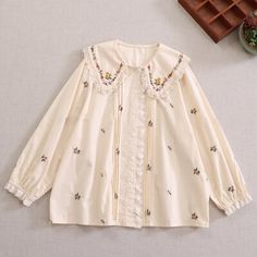 Material: Polyester Measurement cm in Shoulder 40 15.75 Bust 124 48.82 Sleeve 56 22.05 Length 67 26.38 Goblincore Dress, Cottagecore Skirts, Dresses Cottagecore, Fairycore Dresses, Cottagecore Dresses, Fairycore Clothes, Cottagecore Clothes, Peter Pan Collar Blouse, Embroidery Shirt