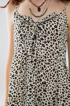 Length: Midi. Subcategory: Dress. Collar: V-neck neckline. Sleeves: Sleeveless style. Print: Animal print. Fit: Standard fit. Fabric: Lightweight woven fabric . Product details: Knot detail. runs true to size. S. 65% Cotton 35% Rayon Tan Scarf, Leopard Print Maxi Dress, Dress Collar, Skirt Jumpsuit, Romper Pants, Printed Maxi, Sweater Coats, Printed Maxi Dress, Hat Hairstyles