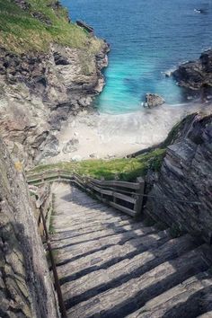 stairs lead down to the beach and ocean