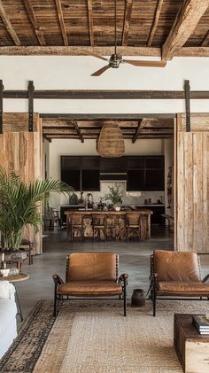 a living room filled with furniture and a ceiling fan