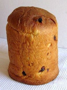 a loaf of bread sitting on top of a white cloth