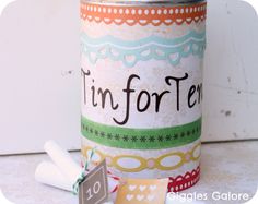 a canister with the word fun for tea written on it next to some candy