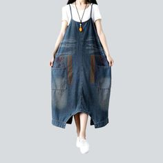 Baggy women's denim jumpsuit online—excellent jeans overall from the 2023 Autumn collection. Street-style trend denim is a fashion style that focuses on the individual's personal expression and unique look. This style celebrates the freedom of self-expression and gives people a chance to make a statement with their clothing choices. It combines classic denim designs with modern trends. allowing for timeless pieces and more personalized looks. Denim in the street-style movement is ideal for peopl Spring Loose Jumpsuits And Rompers With Pockets, Oversized Spring Jumpsuits And Rompers With Pockets, Casual Spring Denim Overall Dress, Casual Denim Blue Overall Dress, Dark Wash Denim Overall Jumpsuit For Spring, Spring Overall Denim Blue Denim Dress, Spring Denim Blue Overall Dress, Oversized Denim Blue Jeans For Summer, Oversized Spring Jumpsuits And Rompers