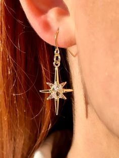 Are you looking for the perfect pair of North Star earrings for someone special this season? Or unique 14K gold star earrings to spoil yourself? Made with tarnish-free 14K gold-filled stainless steel and dazzling cubic zirconia, my celestial earrings in gold are the perfect compliment to any outfit idea! My dainty starburst  earrings are a great gift idea for any special occasion to all the women in your life. You can't go wrong when gifting my celestial dangle earrings to your bestie, wife or g Gold Star Earrings, Gold Starburst, Celestial Earrings, Starburst Earrings, Ringe Gold, Gold Signet Ring, Celestial Jewelry, Cubic Zirconia Earrings, Star Jewelry