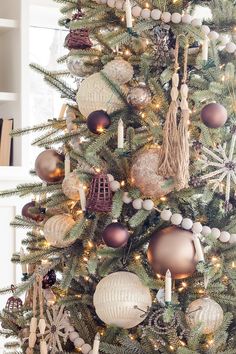 a christmas tree decorated with ornaments and lights