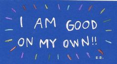 i am good on my own written in white paint with sprinkles against a blue background