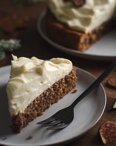 there is a piece of cake on the plate with a fork in front of it