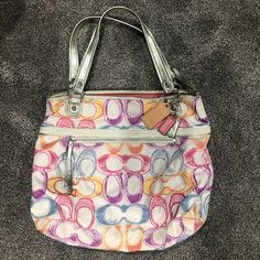 Like Brand New Condition. No Rips, Stains Or Signs Of Wear. Authentic. Beautiful Coral Satin Liner With Two Open Pockets And One Zippered Pocket. The Bag Has A Zip Top Closure And An Outside Zipper Pocket. Coach Tote, Zip Top, Coach Bags, Zipper Pocket, Coral, Bag Lady, Like New, Satin, Brand New