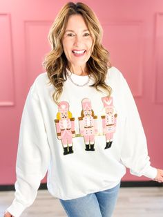 Long sleeve pink Nutcracker sweatshirt. Fabric- 50% Cotton, 50% Polyester Queen Of Sparkles Pink Nutcracker Cardigan, Judith March Sweatshirt, Nutcracker Christmas Tshirt, Pink Christmas Sweatshirt, Pink Cotton Holiday Sweatshirt, Emma Lou, Nutcracker, 50 %, Boutique