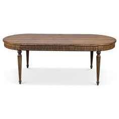 an oval table with wooden legs and wicker design on the top, against a white background