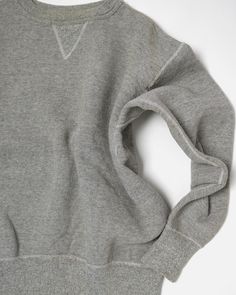 1950's Vintage Made in USA *Product may have slight imperfections such as stains. Gray Vintage Relaxed Fit Tops, Vintage Tops With Relaxed Fit, Vintage Solid Sweater With Ribbed Cuffs, Vintage Gray Crew Neck Sweatshirt, Vintage Gray Crew Sweatshirt, Vintage Crew Neck Tops For Loungewear, Vintage Gray Crew Neck Sweater, Classic Relaxed Fit Sweats, Vintage Sweatshirt With Ribbed Cuffs For Fall