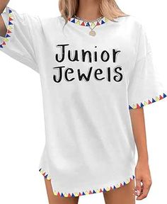 a woman wearing a white shirt with the words junior jewels on it