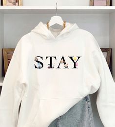 STAY Skzoo printed unisex hoodie from Stray Kids. Our sweatshirts are printed with neat finishes and bright colors. Design and printing are done by us. Sizing is unisex and true to size. For an oversized style, opt for one or two sizes above. You can check the size guide on the last photo. * CHOICE OF SIZE AND COLOR * Colors available: white, pink, red, blue and gray. The available sizes are: S - M - L - XL - 2XL. * HOODIE DETAILS * 100% cotton Soft and light touch * PROCESSING AND SHIPPING TIME Stray Kids Outfits, Kpop Merch, Oversized Style, Really Cute Outfits, Kpop Outfits, Hoodie Design, Hoodie Sweatshirt, Hoodie Print, K Pop