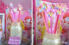 there are many pink and gold straws in the cup with princesses on them