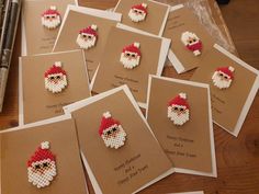 many christmas cards with santa claus on them are laid out and ready to be made into brooches