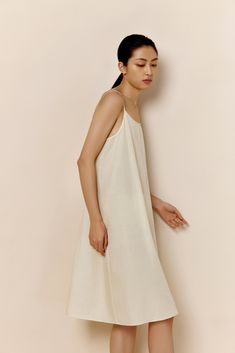 New from our 2022 Spring & Summer Collection, the Silk Cotton Slip Pajama Dress blends elegance and comfort for every evening this summer with a combination of fine silk and skin-friendly cotton — absolutely breathable and effortless to wear, with exquisitely refined design and details that allow you to move to your own rhythm and free your mind. Details Materials & Care Shipping & Returns • Designed in a subtle A-shape: a natural fit with a feminine touch. • Perfectly blends crisp, breathable c Cotton Slip, Pajama Dress, Sleep Dress, Silk Slip, Mulberry Silk, Summer Collection, White Cotton, Final Sale, Care Instructions