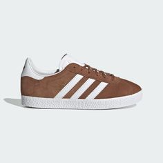 adidas Shop the Gazelle Shoes - Brown at adidas.com/us! See all the styles and colors of Gazelle Shoes - Brown at the official adidas online shop. Brown Gazelle Outfit, Fall Casual Shoes, Adidas Brown Shoes, Casual Brown Adidas Sneakers, Adidas Gazelle Brown, Adidas Gazelle Mustard Yellow, Adidas Gazelle Women, Adidas Gazelle Shoes, Gazelle Shoes