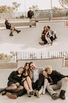 a group of people sitting next to each other on top of a skateboard ramp