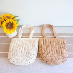 NOW IN STOCK SHIPPING FROM LOS ANGELES Treat yourself to the timeless sophistication of the Elena Handbag. Handcrafted from natural cotton, this elegant crochet tote is the perfect piece for any classic fashionista. With its retro-style and luxurious craftsmanship, you'll enjoy the timeless style and quality of this stunning bag. Size approximately 13.5"H x 12"W x 1"DStrap drop length: 12 inchesZipper closureInterior: Linen Lining Designer Style ID: 8685 Please hand wash carefully with cold water and a mild soap. Do not bleach. Do not iron. Retro Pattern Crochet Tote Bag, Hand Woven, Fashion Shoulder Bag, Gift for Her, Women's Woven Bag Cream Crochet Bag For Everyday Summer, Everyday Summer Crochet Bag In Cream, Natural Cotton Straw Bag For Everyday Use, Everyday Cream Crochet Summer Bag, Everyday Natural Cotton Straw Bag, Everyday Summer Cream Crochet Bag, Beige Woven Cotton Straw Bag, Everyday Cream Crochet Woven Bag, Cream Cotton Crochet Bag For Everyday Use