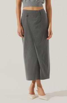 Polished pinstripes take on a jaunty attitude in a straight skirt cut in an off-center silhouette. 34" length (size Medium) Front button closure Front slant pockets Unlined 87% polyester, 10% rayon, 3% elastane Dry clean Imported Striped Midi Skirt For Work, Striped Lined Skirt For Workwear, Striped Lined Skirt Bottoms For Workwear, Chic Pinstripe Skirt For Work, Pinstripe Vertical Stripes Skirt For Work, Chic Pinstripe Skirt For Spring, Striped Relaxed Fit Midi Skirt, Fitted Pinstripe Skirt For Work, Fitted Striped Pencil Skirt