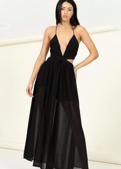 Be a head-turner when you enter the room wearing this sexy black maxi dress. Perfect for most anywhere you're headed, this festival ready maxi dress features soft, easy lines and versatile styling options. The long flowy dress features a deep v-neckline, halter neck cut, as well as ultra-fierce cutouts along the torso that will show alluring hints of skin. Available in sizes S, M and L. Made out of 100% polyester. Accentuate your beauty no matter where you go when you slip on this stunning black Black Chiffon Maxi Dress For Party, Chic Floor-length Backless Dress For Vacation, Summer Backless Floor-length Dress For Night Out, Summer Floor-length Backless Dress For Night Out, Fitted Maxi Length Beach Party Dress, Summer Backless Maxi Dress For Date Night, Summer Backless Maxi Dress For Night Out, Spring Floor-length Maxi Dress For Date Night, Summer Backless Maxi Dress For Party