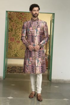 Rose wine sherwani with floral and geometric motifs in a mosaic patterned base, highlighted by placed floral embroidery. Comes with inner kurta and churidar. - Aza Fashions Designer Straight Kurta For Reception, Traditional Kurta With Meenakari, Designer Straight Kurta Sherwani For Diwali, Designer Pink Sherwani, Designer Sherwani Straight Kurta For Festivals, Long Sleeve Traditional Wear With Meenakari For Diwali, Fitted Meenakari Kurta For Festivals, Designer Pink Sherwani For Festive Season, Designer Pink Sherwani With Cutdana