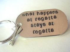 a keychain that says, what happens at regata stays at regata